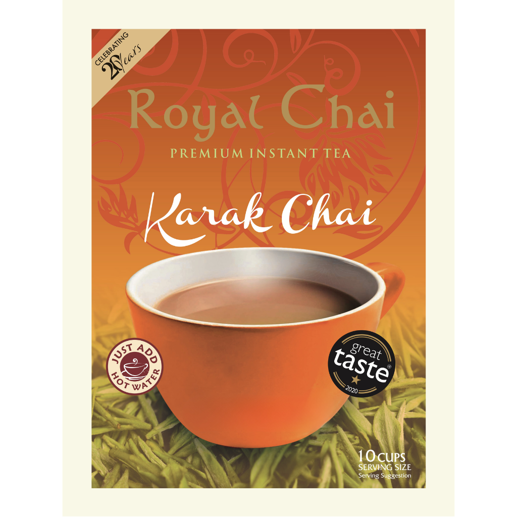 Royal Chai Karak Chai premium instant tea package with a cup of tea on an orange background.